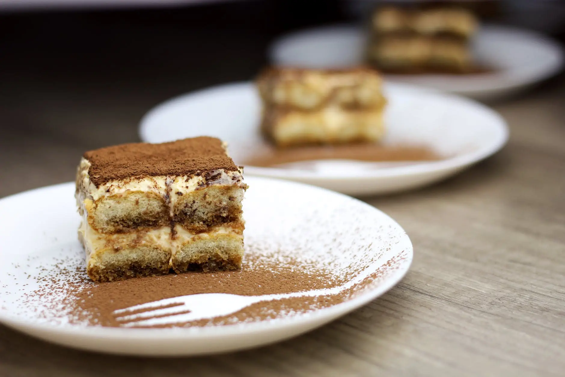 close up shot of a delicious tiramisu on a plate