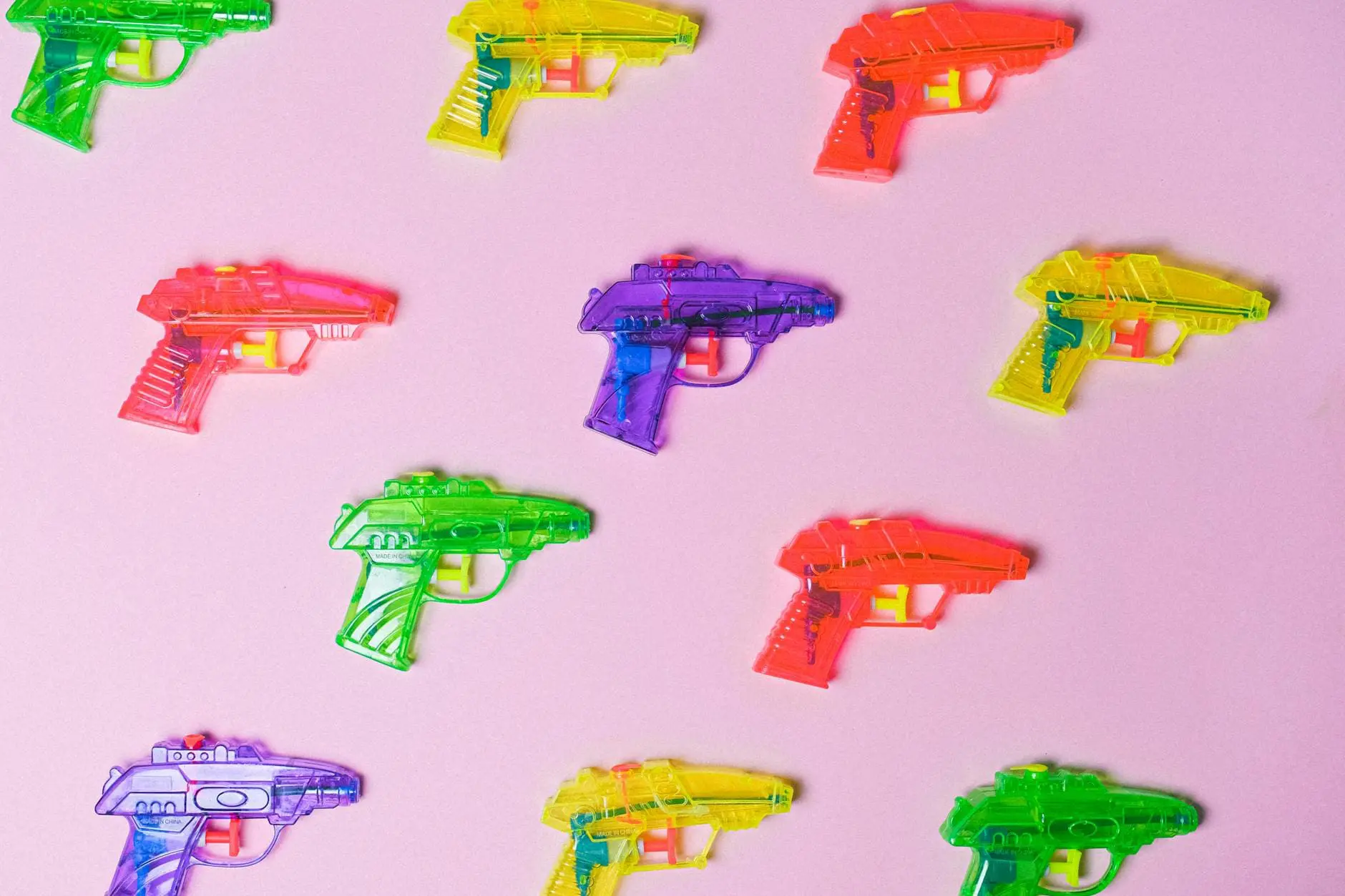 assortment of colorful guns for game to set goals examples