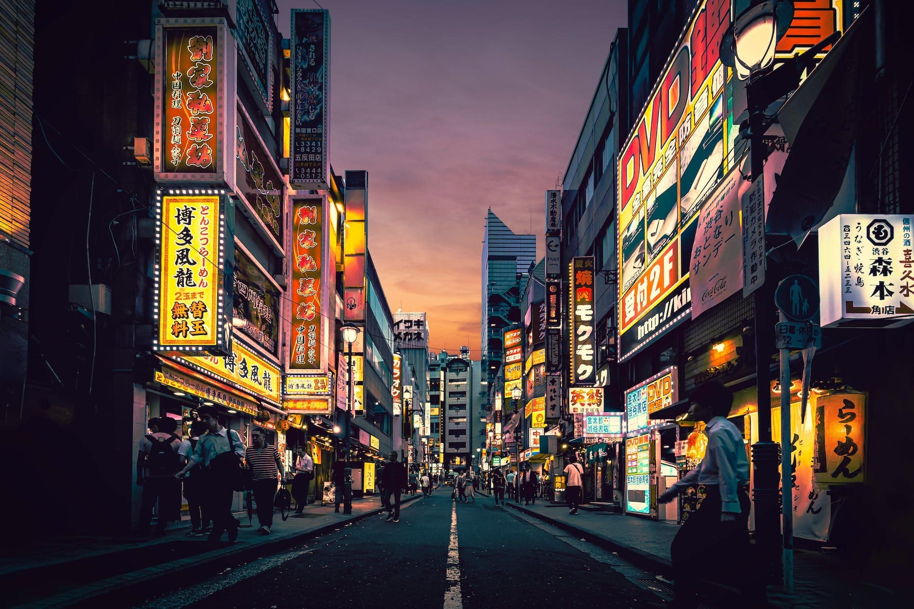 people walking on street near buildings in Tokyo during vacations at xmas