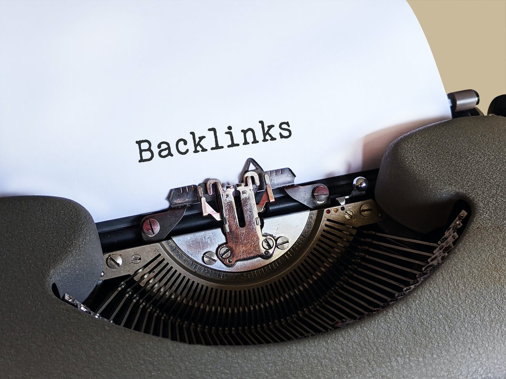 gray typewriter with white paper